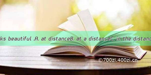 This picture looks beautiful .A. at distanceB. at a distanceC. in the distanceD. in distan