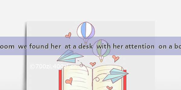 In the reading room  we found her  at a desk  with her attention  on a book.A. seating; fi